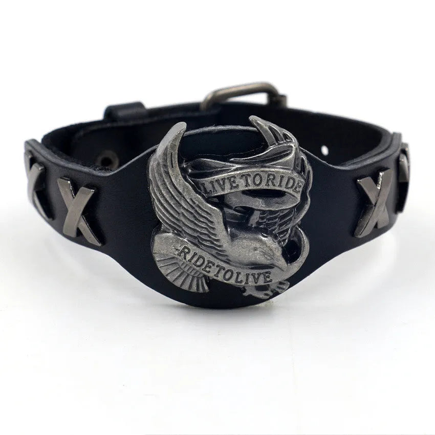 Black geometric leather bracelet with alloy eagle watch-button closure showing varying width from 1.7cm to 3.8cm