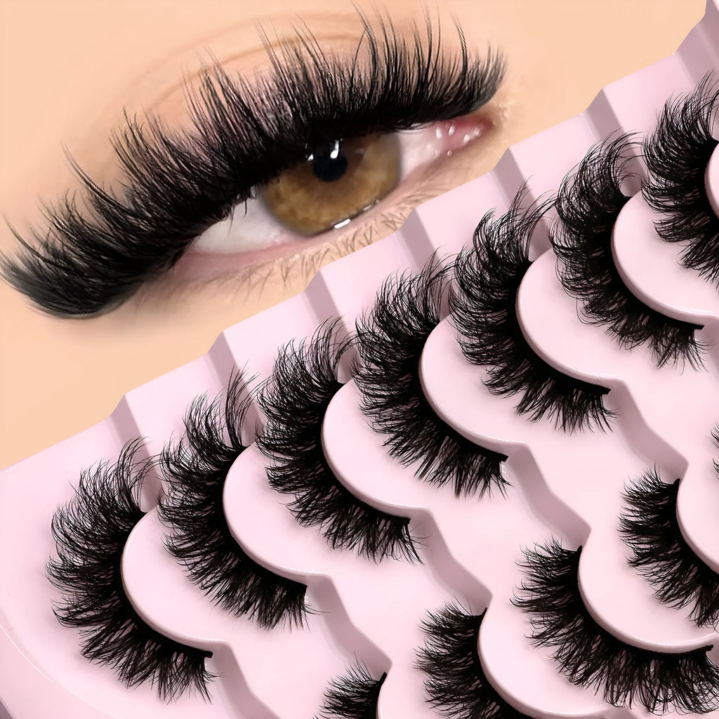 Box of artificial fibre false eyelashes with thick natural long style and included adhesive glue