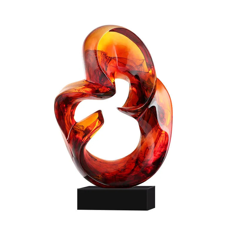 Transparent resin modern sculpture ornament in orange red colour on display surface