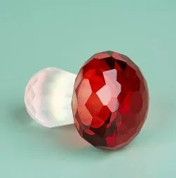 Colourful crystal mushroom decoration in geometric style measuring 40mm by 53mm