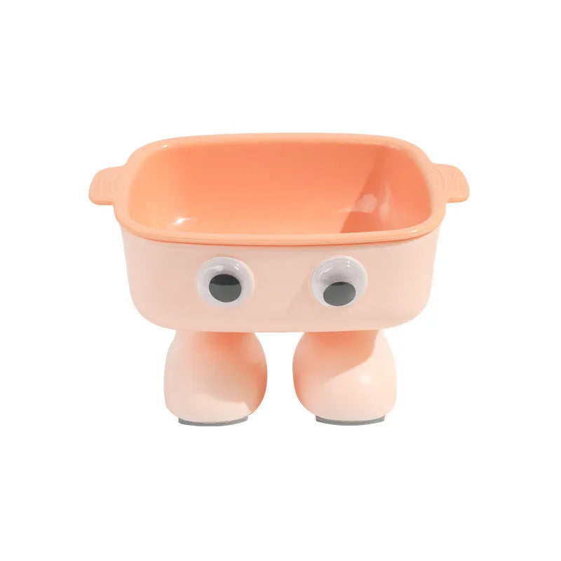 Green elevated cat bowl with robot shape design on anti-slip base showing tilted angle for feeding