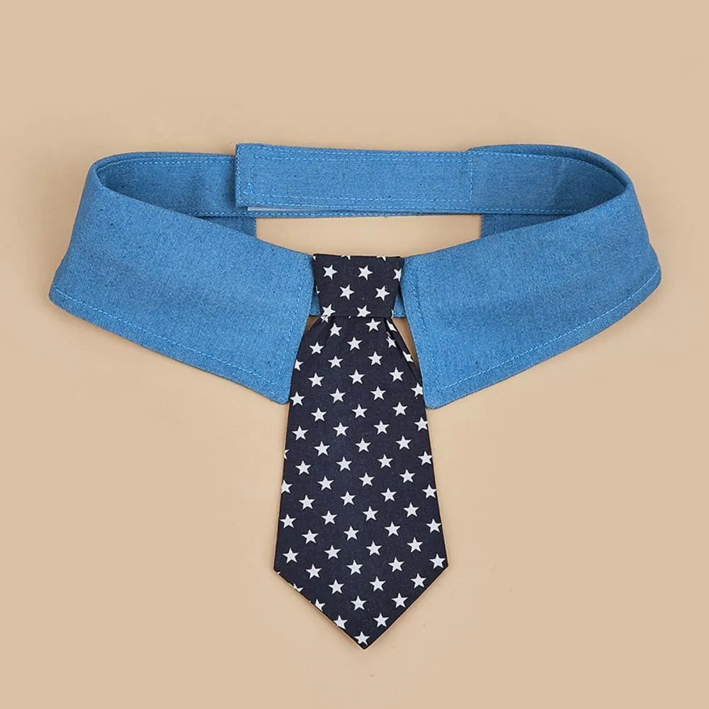 Denim pet collar with star pattern and bow tie on a table, adjustable fastener tape closure