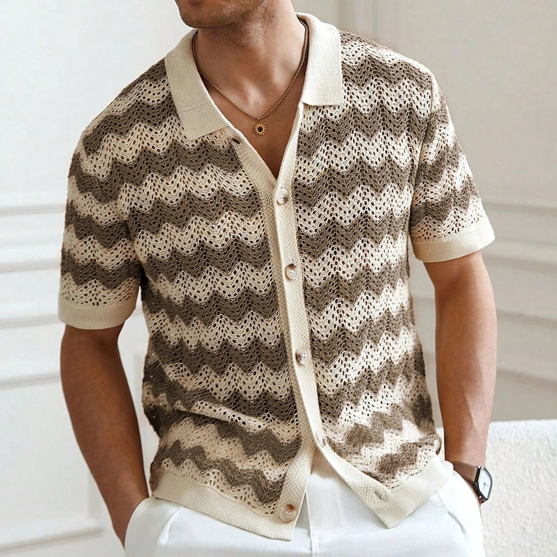 Yellow, blue, and brown short-sleeve sweater with hollow jacquard corrugated texture and flocking detail.