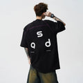 Cotton letter print short-sleeve T-shirt, loose fit round neck, available in black, white, sizes M to 2XL