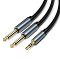 3.5mm to two 6.5mm male audio cable with gold-plated connectors on a black background