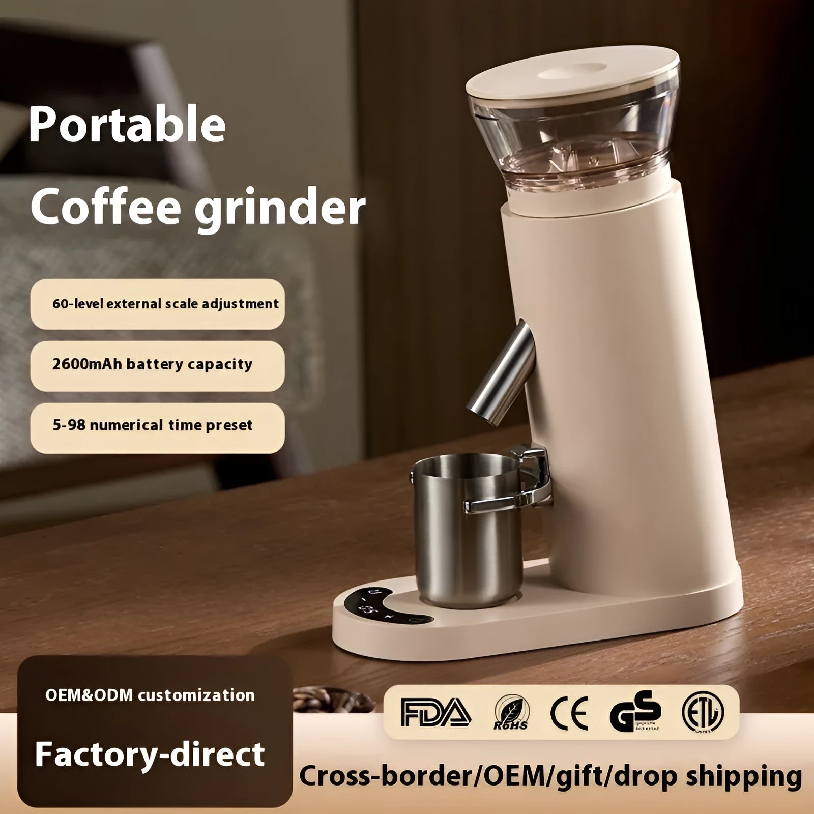 Automatic stainless steel coffee grinder machine in beige colour on a countertop.