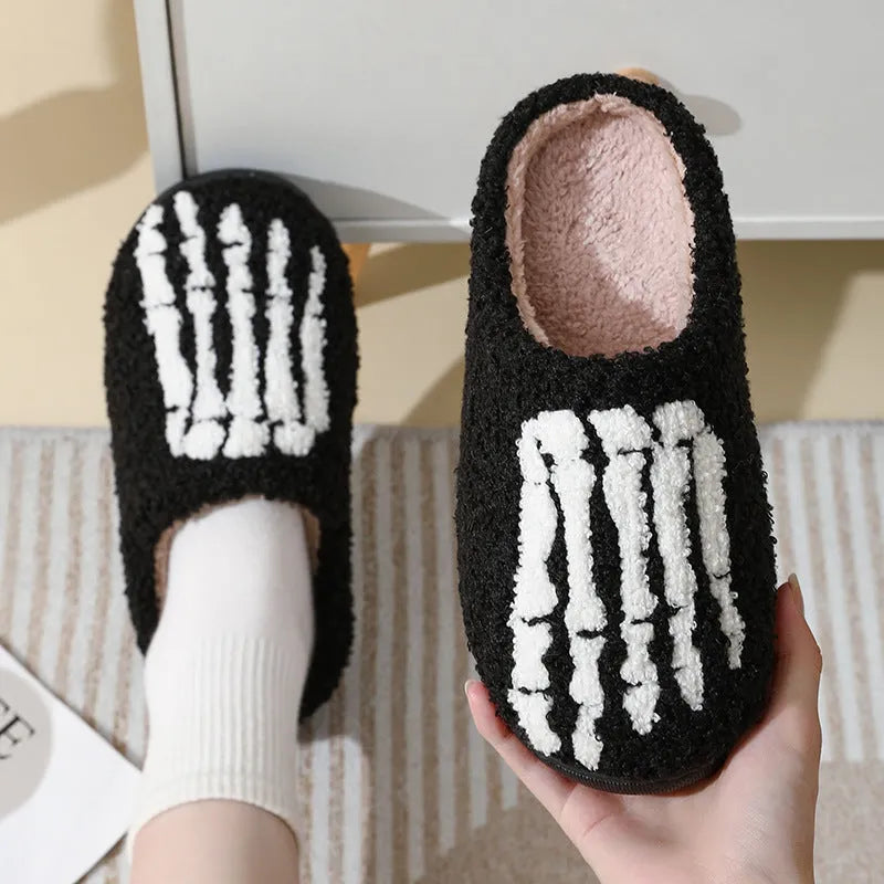 Cartoon ghost hand thermal cotton slippers with suede upper and rubber sole on indoor floor