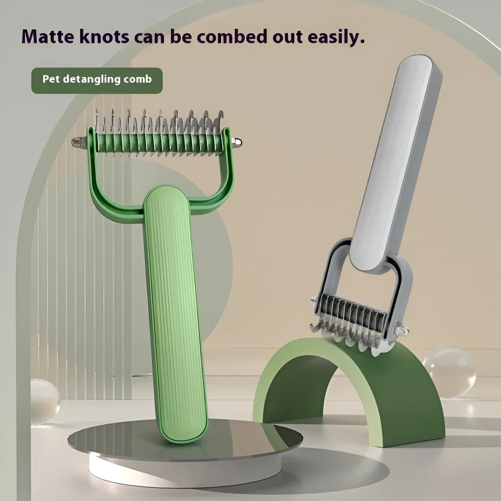 Green and grey dog unknotting combs with stainless steel teeth and plastic handles in small and large sizes.