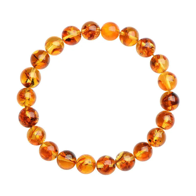 Natural yellow piebald amber bracelet with flower spot patterning and geometry beads