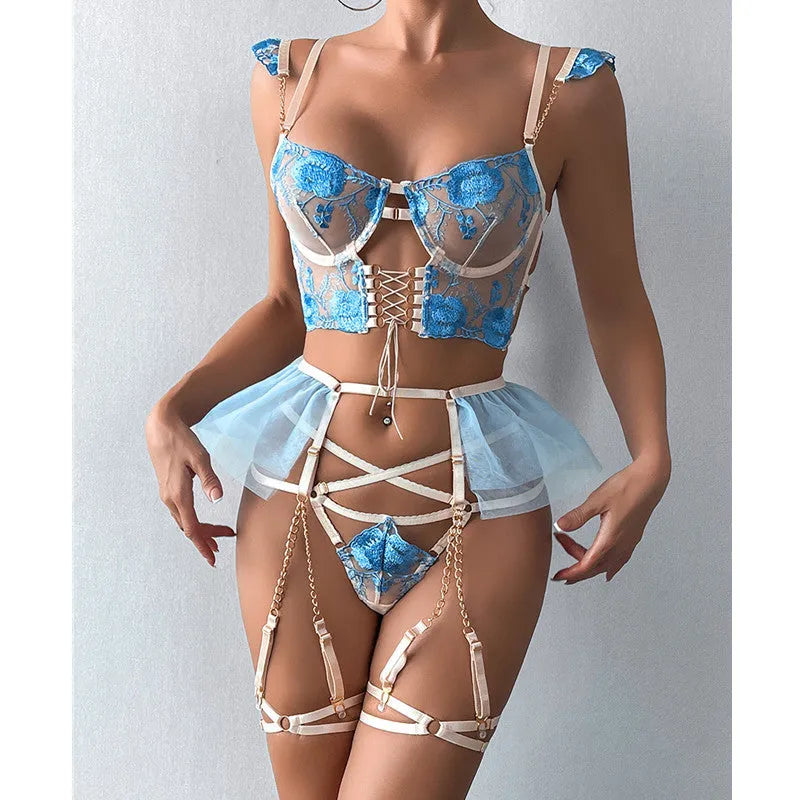 Light blue embroidered lace women's bra and brief set with transparent mesh panels.
