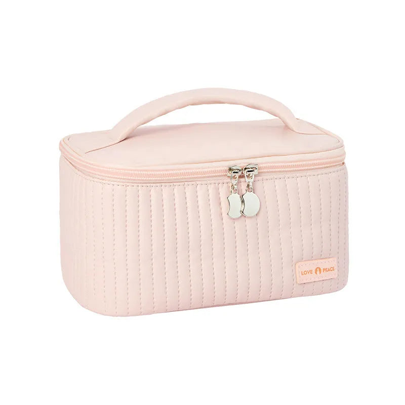 Open-top cake style makeup bag in PU leather, shown in one of six solid colours