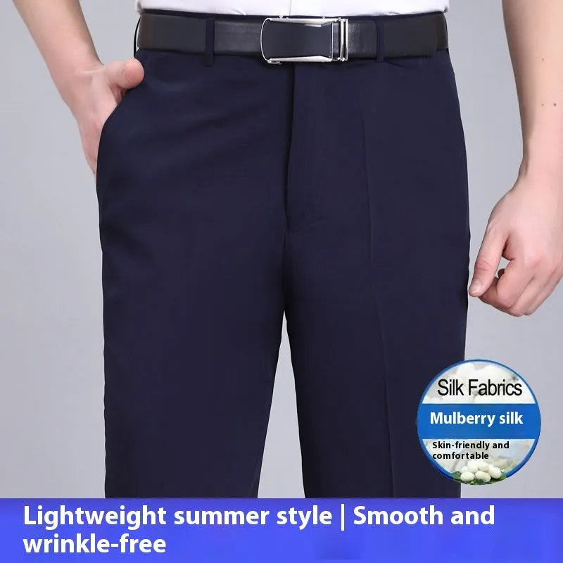 Man wearing dark blue straight-leg mulberry silk blend suit trousers with a high waist.