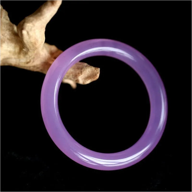 Natural jade bracelet with polished floating flower pattern and auspicious cloud motif, available in multiple colours and sizes