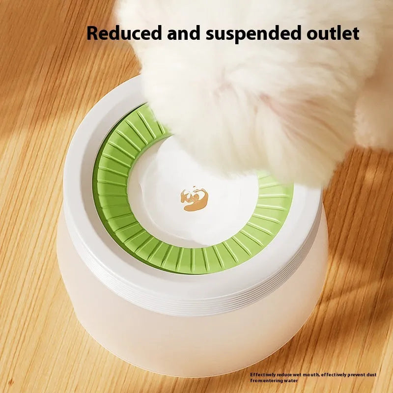 Green suspension water bowl for dogs and cats with non-wet mouth design on white background
