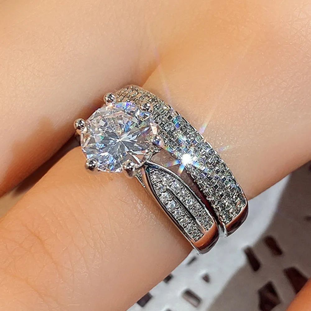 White gold colour alloy wedding bracelet with combined ring design and round geometry elements
