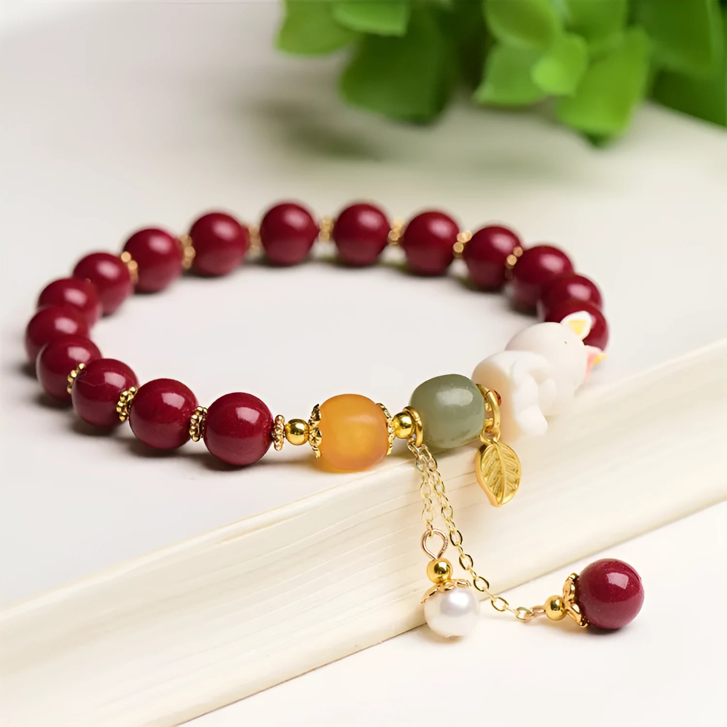 Tian Yu natural cinnabar bracelet with bunny rabbit design, 8mm or 10mm beads for women