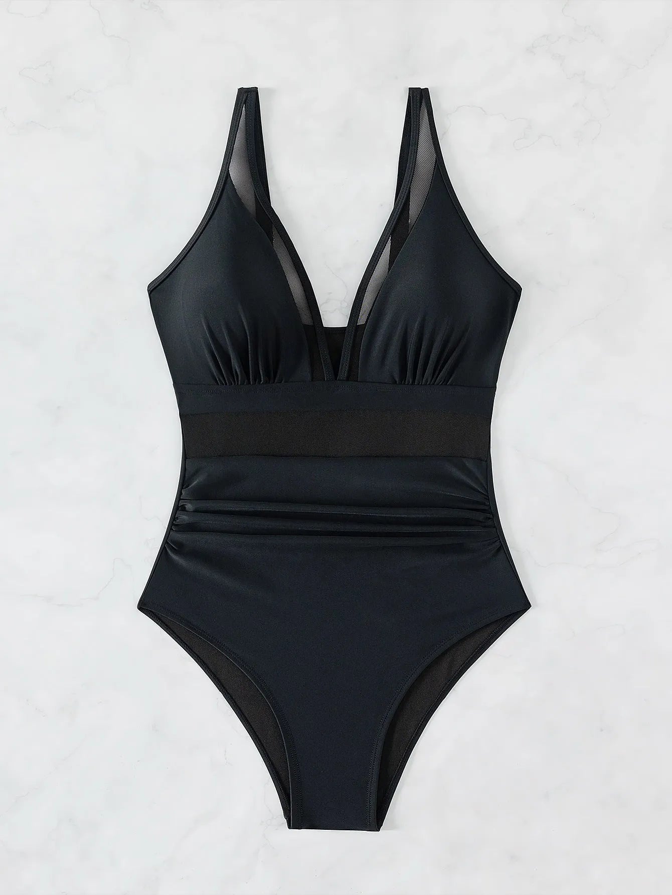 Black women's one-piece swimsuit with halter neck and mesh panel detailing.