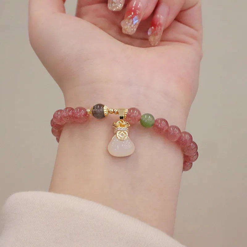 Natural strawberry quartz geometric bracelet with peace buckle and lucky Bagg elements for women