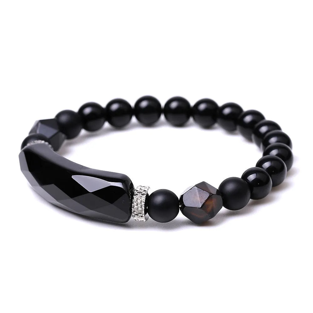 Handmade diamond-cut black agate bracelet for women and men on white background