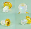 Colourful crystal mushroom decoration in geometric style measuring 40mm by 53mm