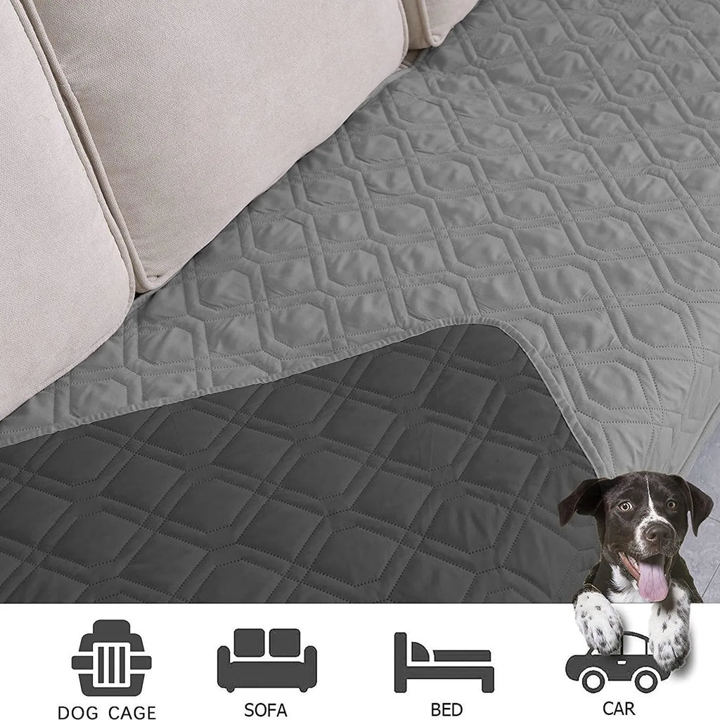 Soft reversible dog blanket couch cover in burgundy with grey reverse side, laid flat on sofa