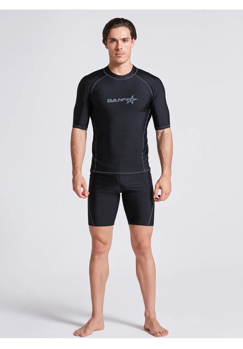Men's quick-drying half sleeve swimsuit in blue with separate top and pants for snorkelling and surfing