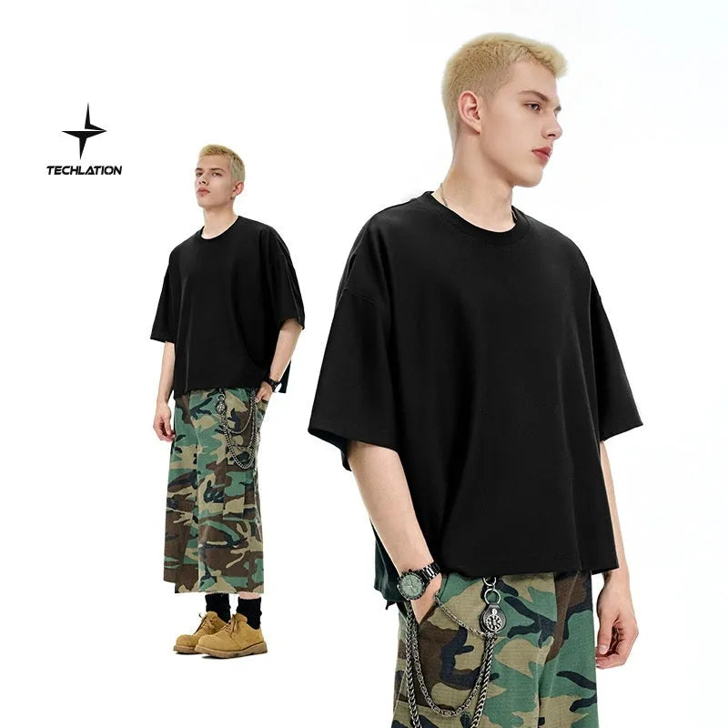 Men's sand grey short sleeve pullover showing loose fit and regular sleeve construction
