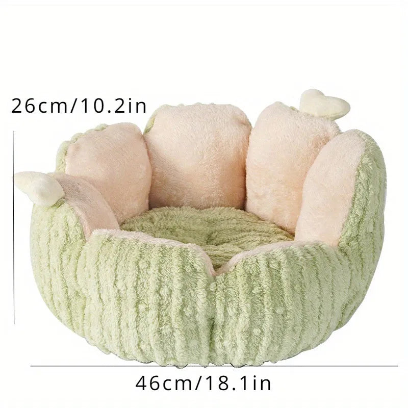 Soft green cactus-shaped cat litter kennel for dogs and cats on a floor.