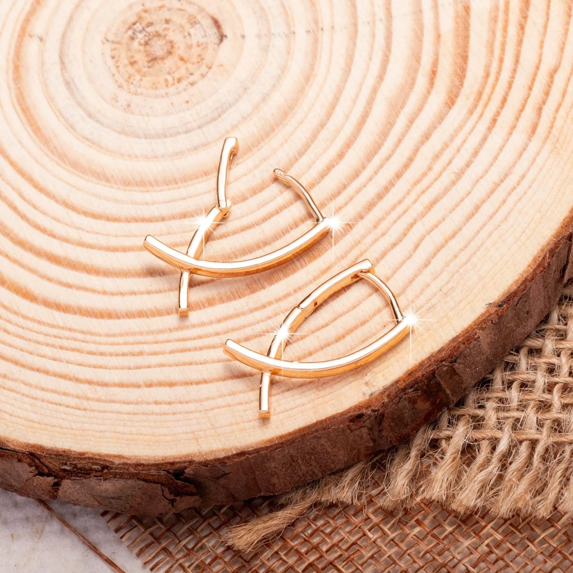 Rose gold plated copper cross shaped earrings with light luxury design