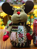 Set of three flannel Christmas decorations: snowman, elk and old man, each red green and white, 18 by 13 centimetres