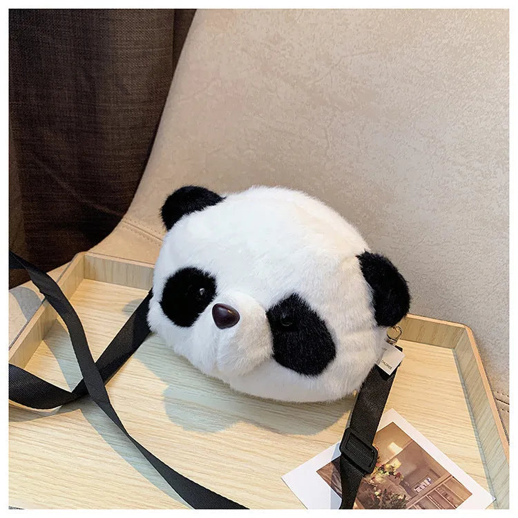 Plush panda head design cylindrical crossbody bag measuring 18cm wide
