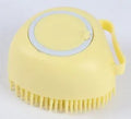 Silicone dog bath brush in blue, pink, and yellow – 9x6x8.5cm pack size