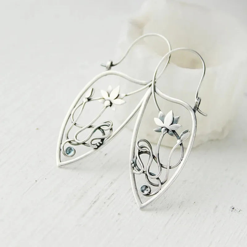 Pair of silver electroplated alloy lotus vine flower geometry earrings for women, retro style