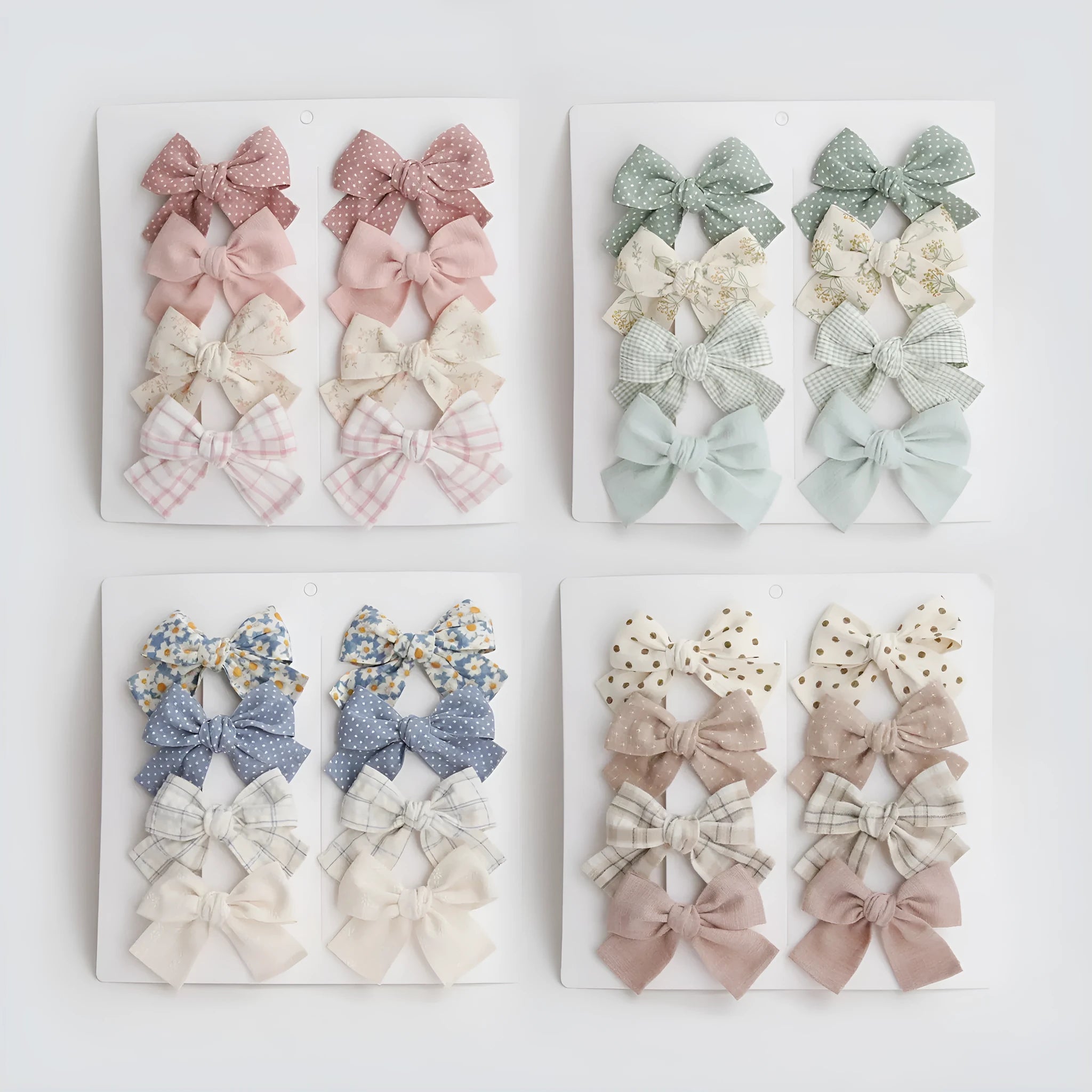 Children's fabric dovetail bow hairclips in eight colour sets including beige, blue flowers, coffee polka dot, green dots, pink, rice coffee, wine red plaid floral, and yellow