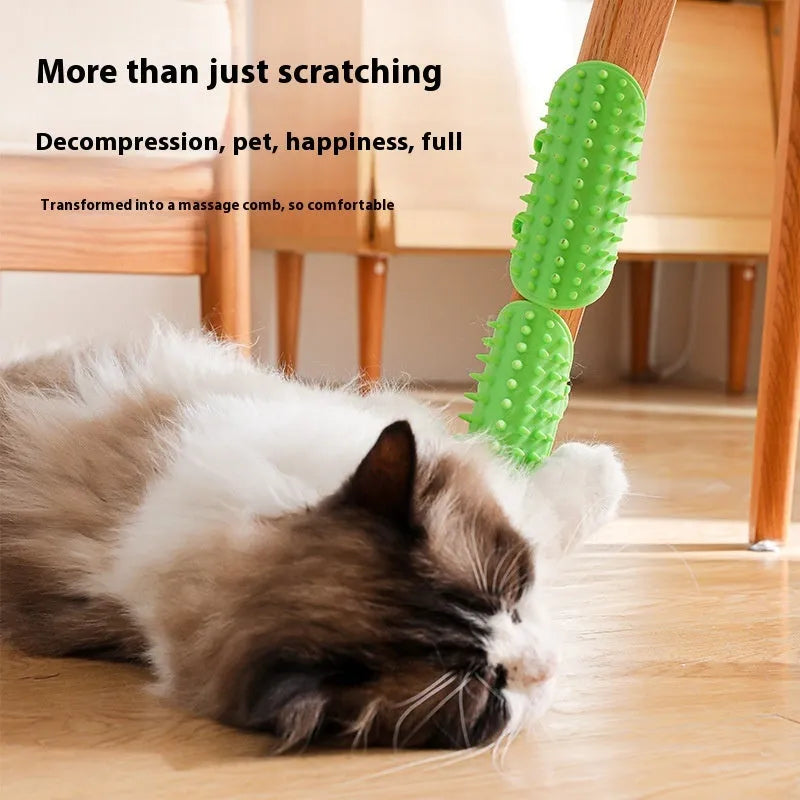 Silicone cat grooming comb with adjustable strap mounted on a table leg