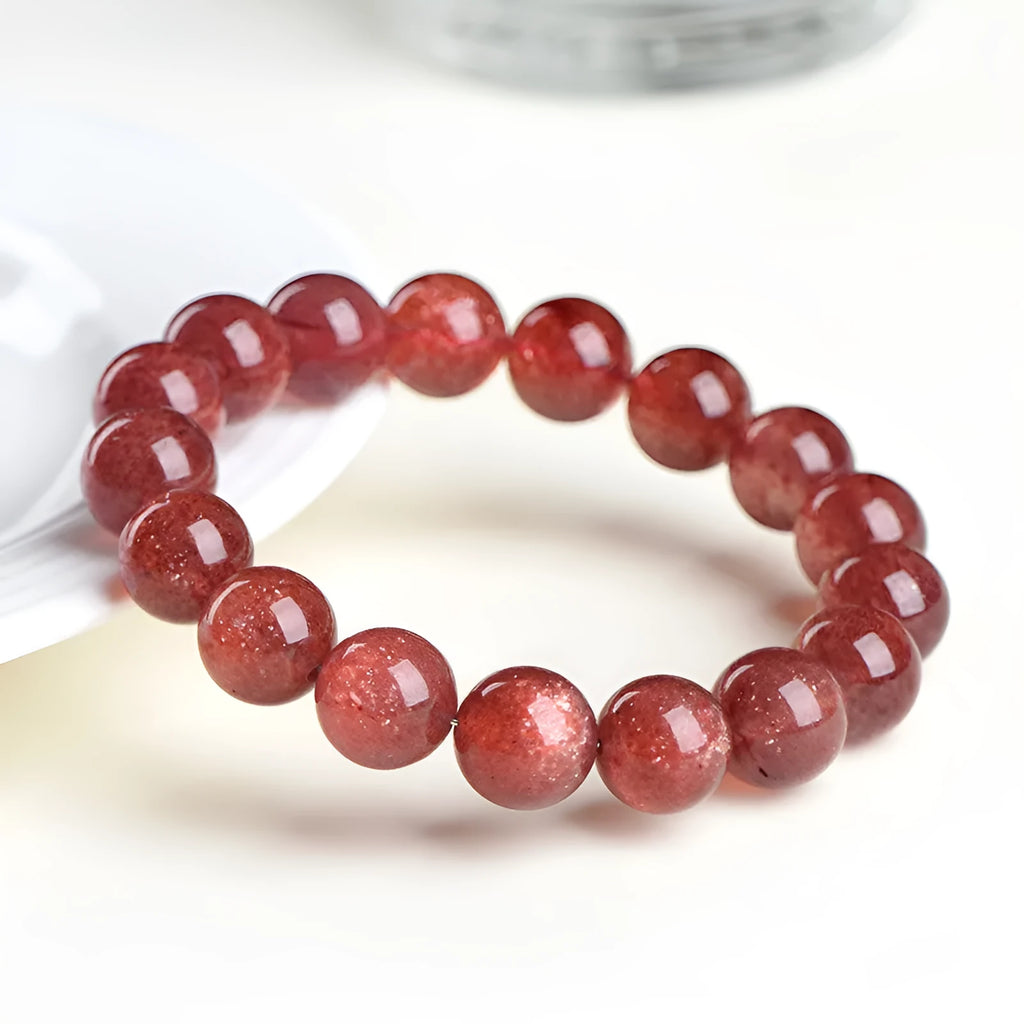 Natural strawberry quartz bracelet with geometric stones in starlight cherry red colour, shown in three size variations