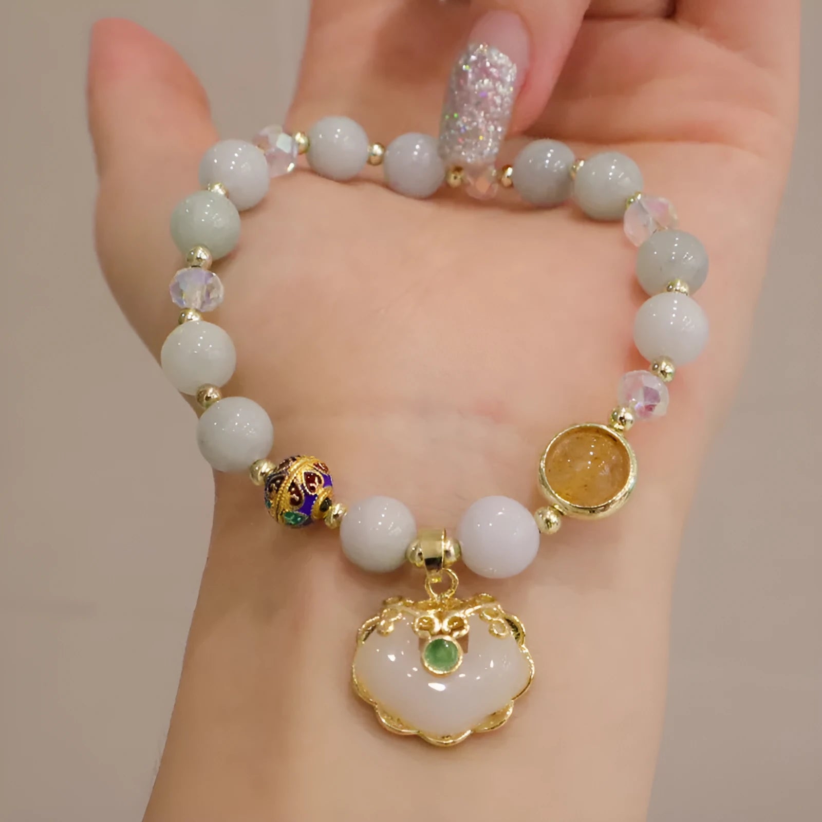 Women's bracelet with jade bead in geometric shape and metal three-dimensional ethnic decoration