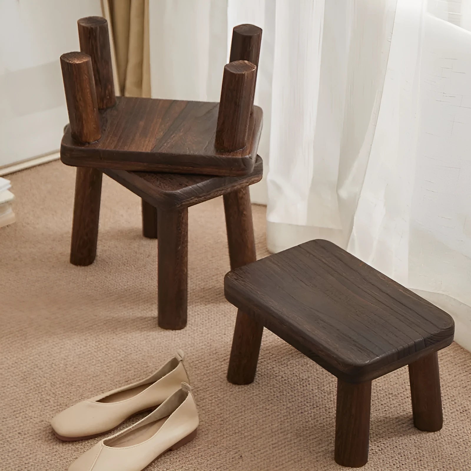 Distressed wooden stool with bracket structure legs in rustic finish