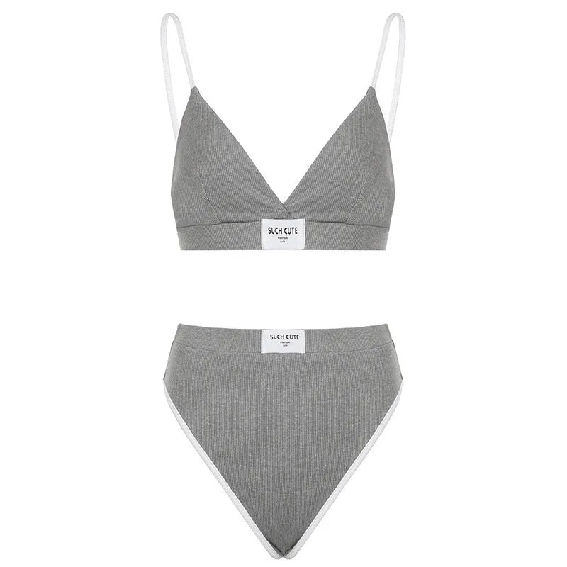 Female bikini set with embroidery and contrast colour binding letters in black, grey, or white