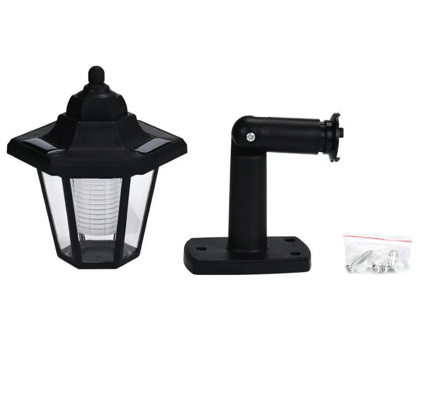 Black hexagonal solar wall lamp with IP44 waterproof rating for outdoor garden installation