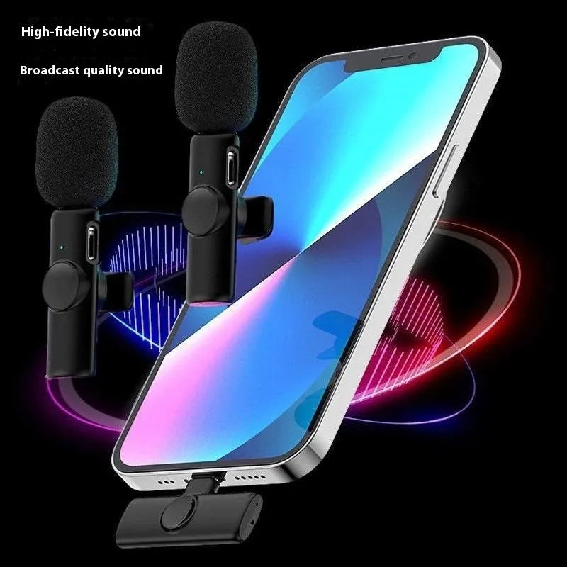 A wireless lavalier clip-on microphone attached to a shirt collar for hands-free video recording.