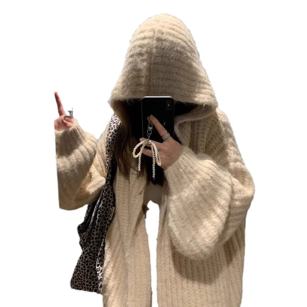 Women's dark grey loose-fit hooded cardigan sweater with chunky acrylic knit texture.