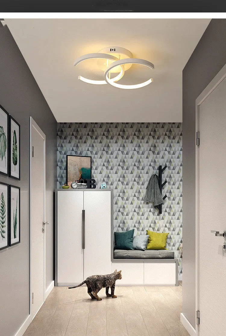 Three styles of commercial LED corridor ceiling lights: black semicircle, white circle, and white bipartite.