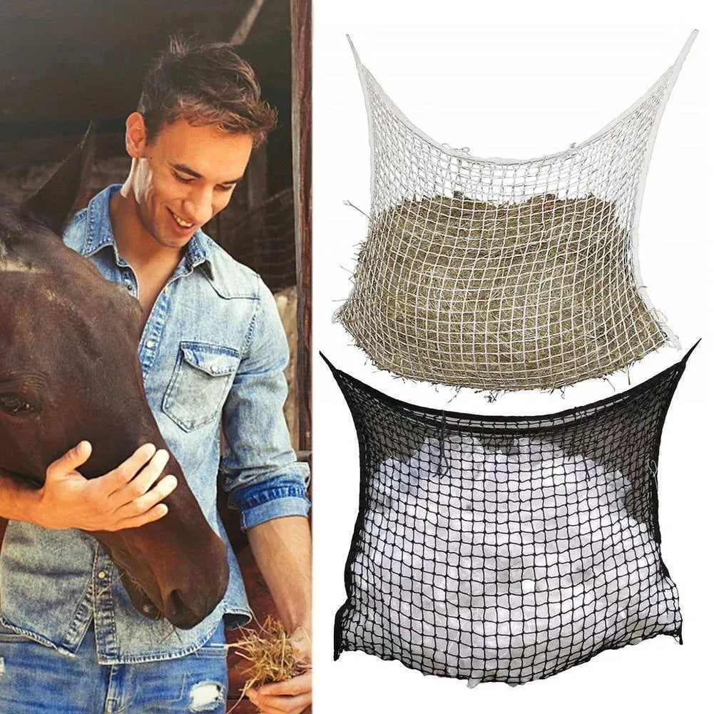 Woven PE rope horse feeding bag with grid pattern in black colour, shown hanging with hay