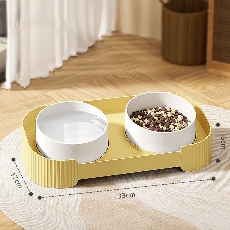 Green ceramic elevated cat bowls with 15-degree tilt and non-slip base