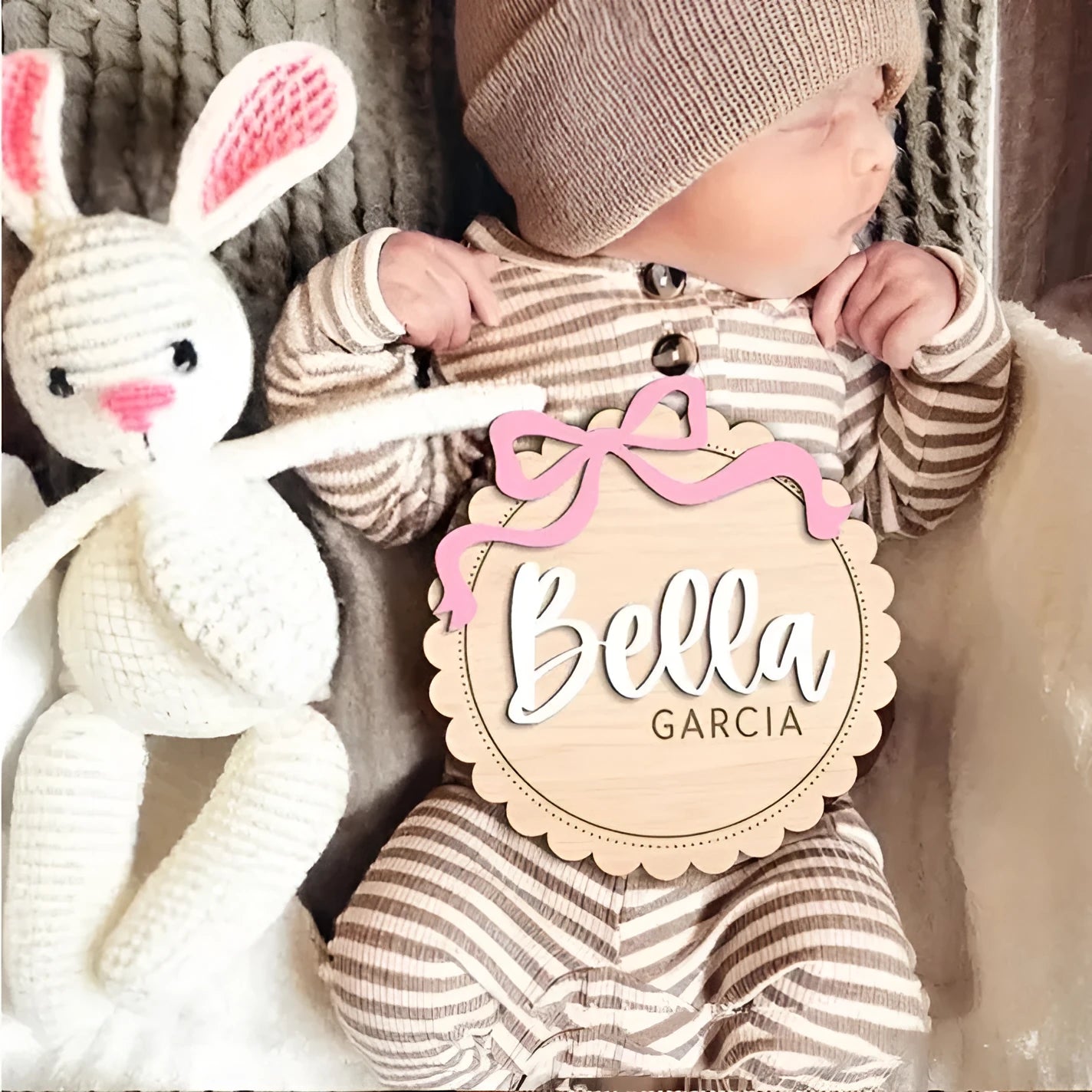 Custom wooden square ornament with a personalised baby name for nursery decoration.