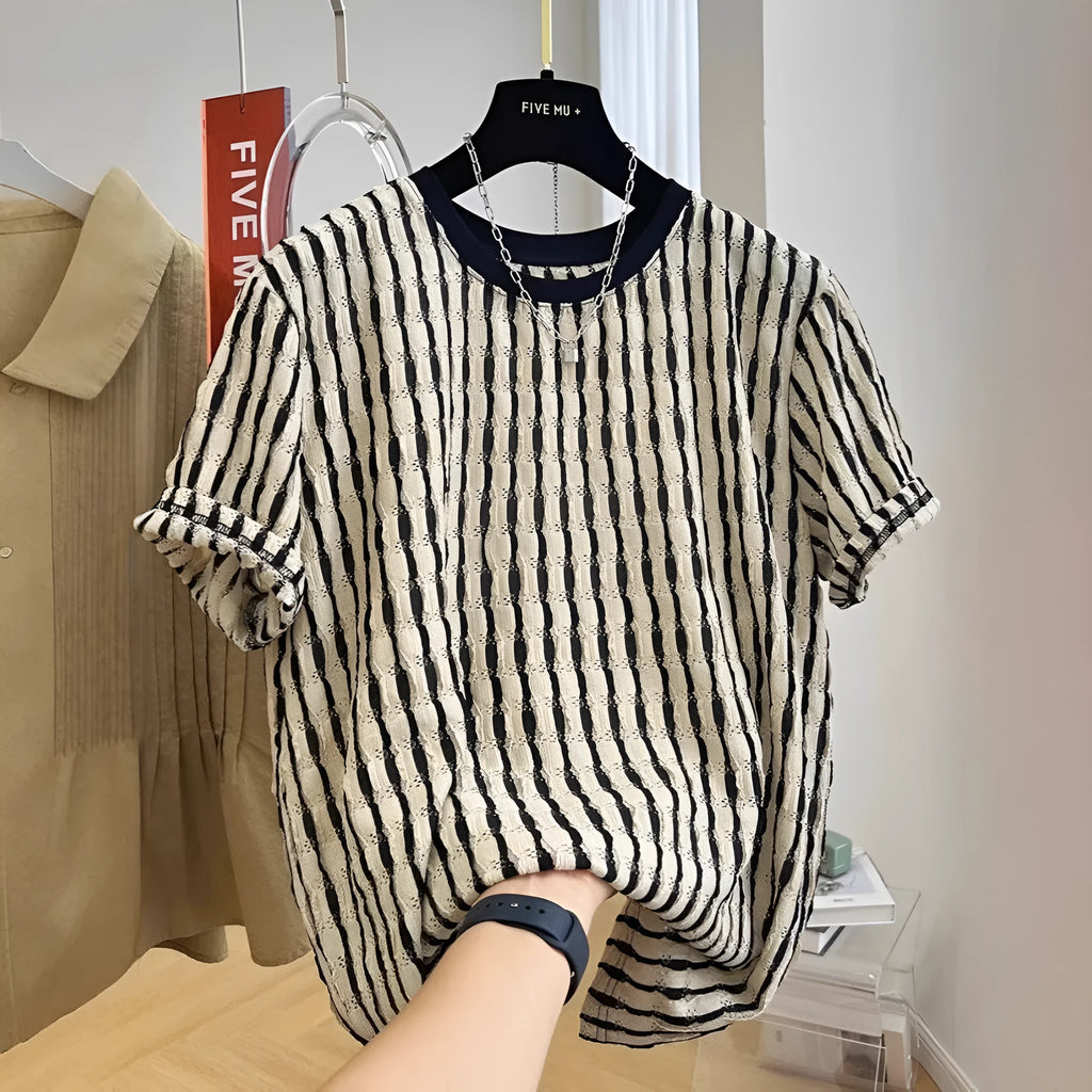 Men's black striped casual shirt with loose fit and short sleeves on hanger