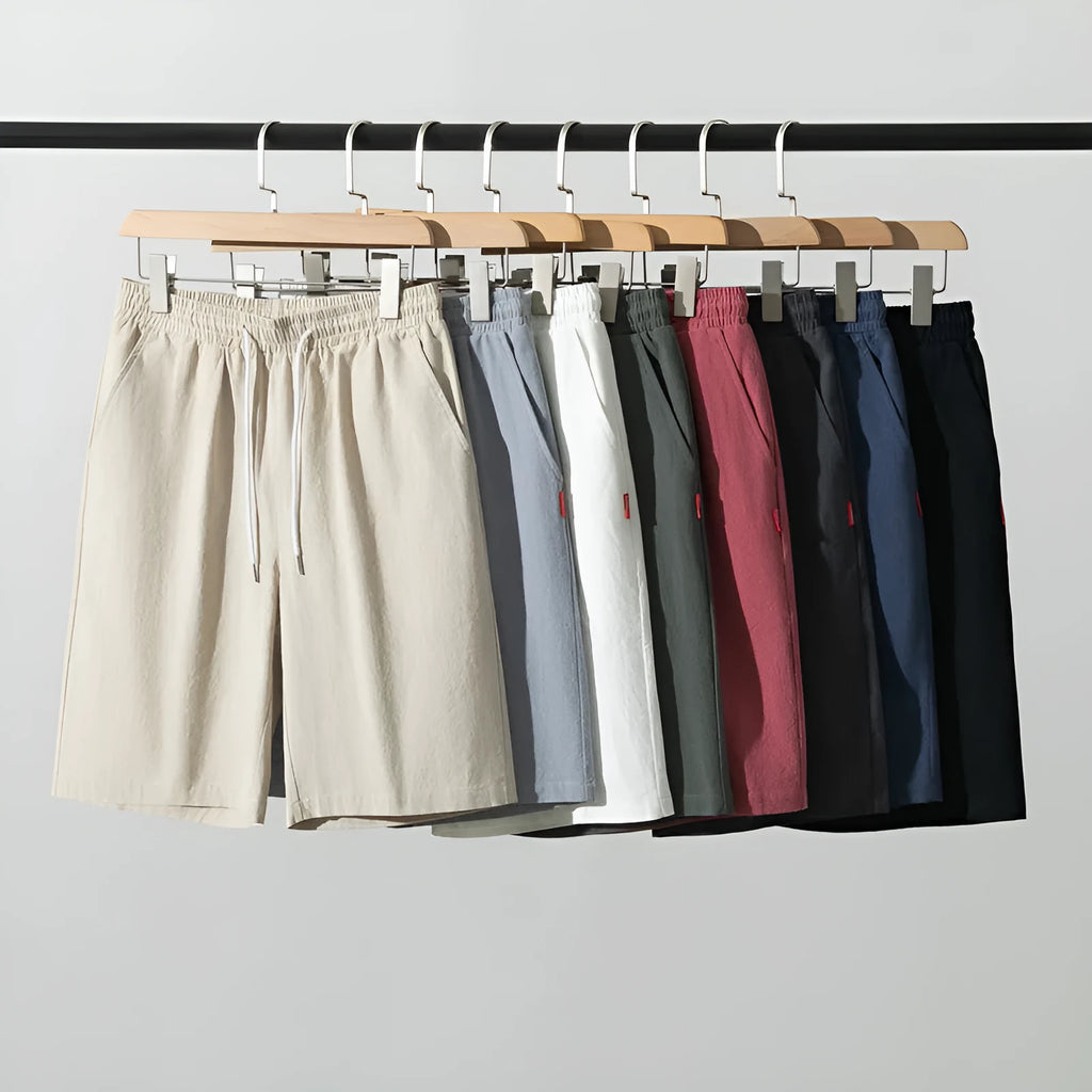 Solid colour cotton-linen cropped pants with a drawstring waist, shown in Army Green.