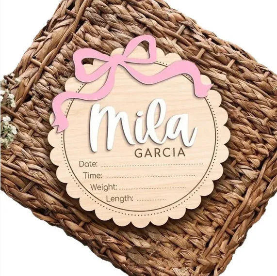 Custom wooden square ornament with a personalised baby name for nursery decoration.