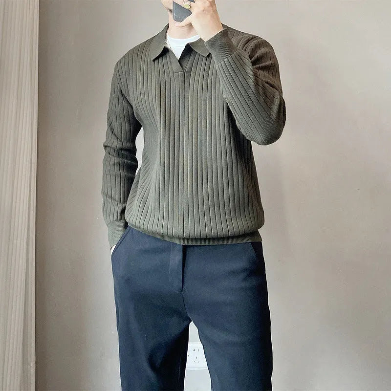 Man wearing a loose fit striped lapel pullover sweater in a rabbit fur and modal blend.